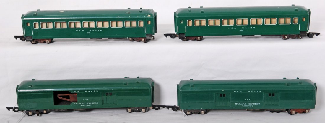 American Flyer New Haven 718, 650, 651: American Flyer postwar S gauge New Haven passenger cars. Includes 718 New Haven operating mail pickup car, two 650 coaches, and 651 baggage. Cars are C6-7. some paint wear on roofs, and some discolora