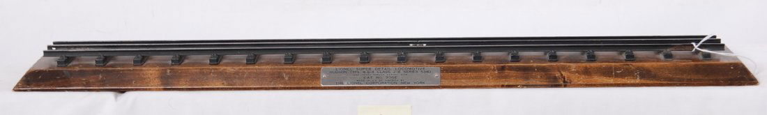 Lionel prewar 700E 5344 original display board: Lionel prewar O gauge 700E 5344 original display board. The outer two rails are original to the piece, the inner rail has been replaced with original T rail but is not a long section- it is two pieces