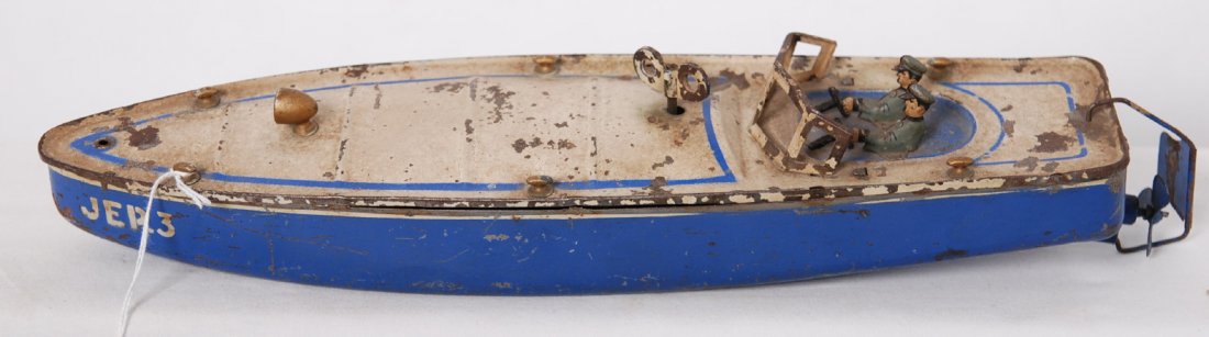JEP.3 speedboat driver and throttle operator, ke: JEP.3 key wind mechanical tin speedboat with driver and throttle operator, C5-6. Possibly missing a cleat. Motor doesnÕt work, but spring feels intact. Boat will clean to look a little nicer.