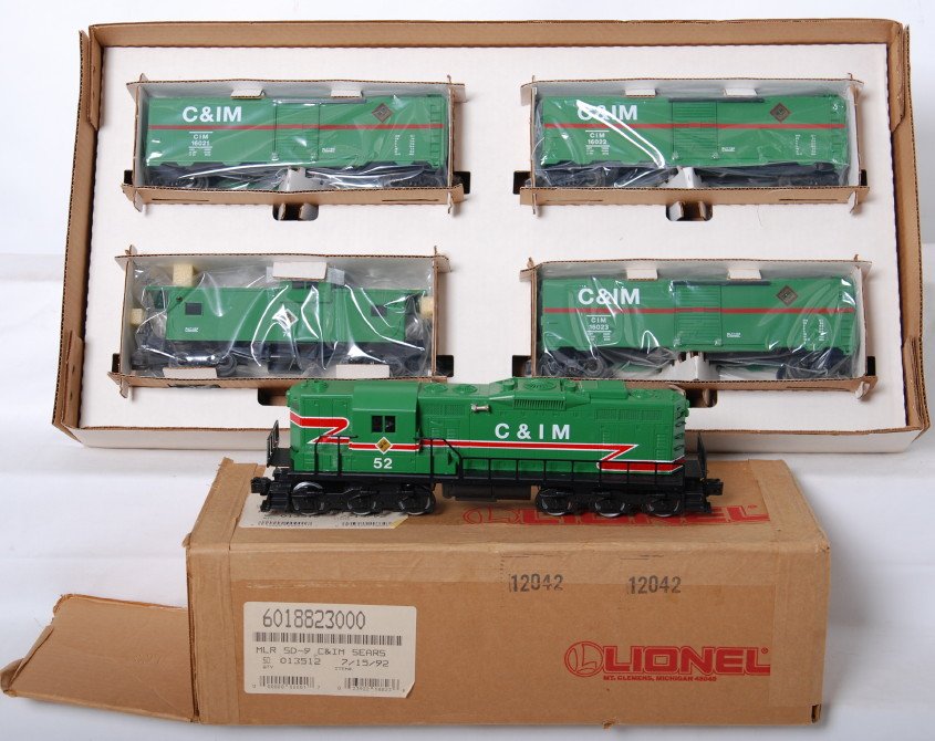 Lionel C and IM 18823 SD-9 18556 cars: Lionel modern O gauge 18823 Chicago and Illinois Midland SD-9 diesel and Sears 18556 Chicago and Illinois Midland caboose and freight car set in OBs. Loco is C8, cars are C8-9.