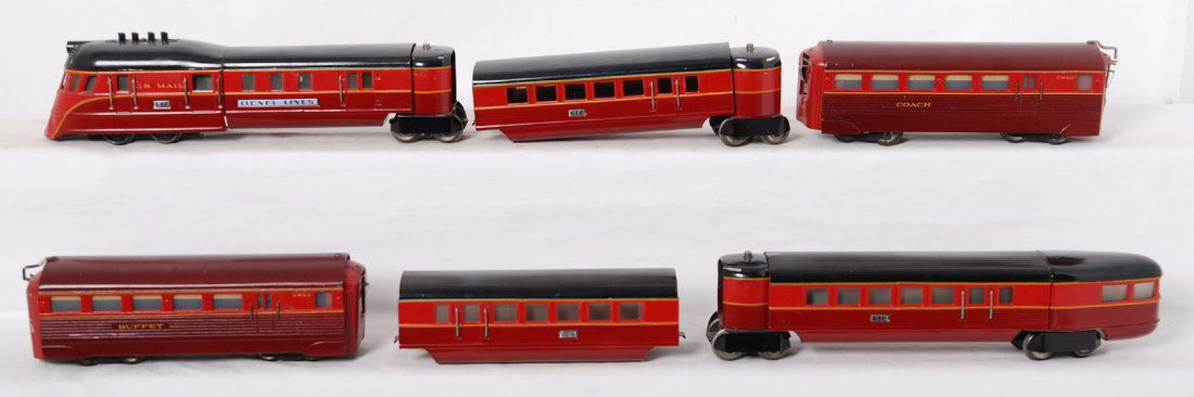Lionel custom GM&O Flying Yankee: Lionel prewar O gauge custom painted Gulf Mobile and Ohio Flying Yankee train set. Includes powered unit, two coaches, and observation car. Also included buffet and coach from a different train set. T