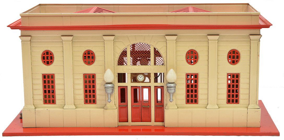 Lionel 116 Lionel City Station w/Red Base: Lionel prewar standard gauge 116 Lionel City station with train control, red base and trim, ivory walls and aluminum painted light fixtures. Both clocks have rust, otherwise the station is C7.