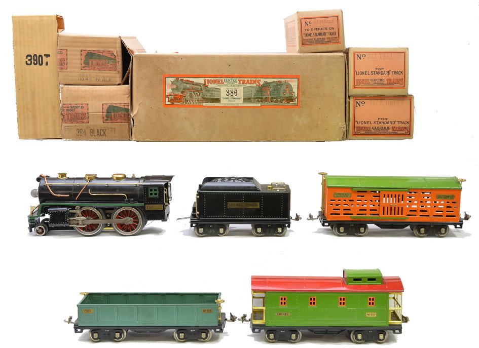 Lionel Prewar Std. Ga. Freight Set no. 386 LN OBs: Lionel prewar standard gauge freight set no. 386 in individual OBs and set box including; 384 black 2-4-0 steam loco, 384T tender with original cardboard insert, 512 peacock gondola, 513 orange cattle