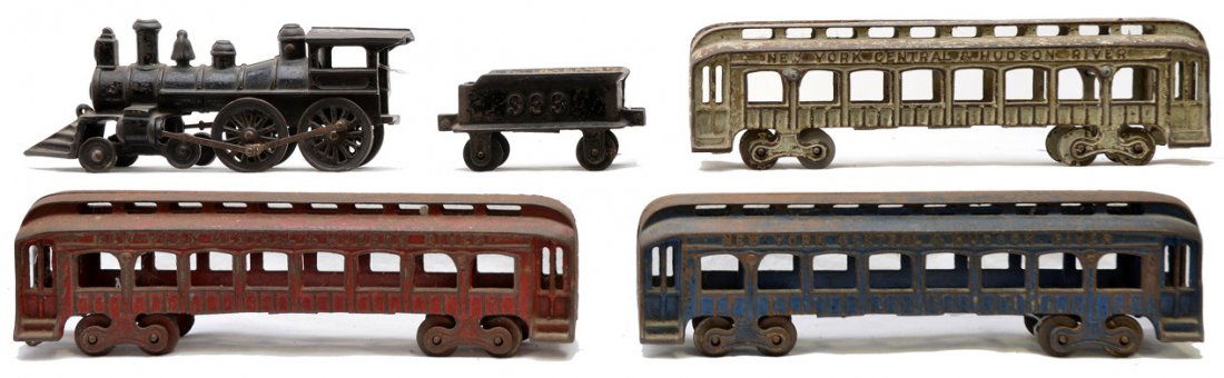 Dent Hdw Fullerton, PA Cast Iron NYC & HR Train: Dent Hardware of Fullerton, PA cast iron NYC & Hudson River floor toy passenger train set, circa 1917 including; steam loco 999 tender and three red, white and blue coaches. The coaches are lettered N