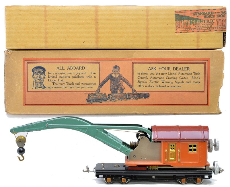 Lionel 810 Crane Terra Cotta/Maroon/Peacock OB: Lionel prewar O gauge 810 crane with terra cotta cab, maroon roof, peacock boom, brass trim, nickel knobs and copper journals in OB that has a clean original insert. The crane is C7-8. The OB is missi