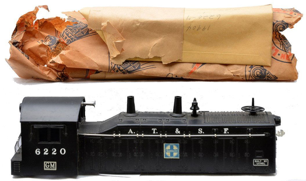 Lionel Replacement Cab ONLY 6220 ATSF Switcher: Lionel postwar replacement cab only for a 6220 AT&SF NW2 switcher in original paper wrap. This is the version with the large GM decal below the number on the cab. The cab is factory new and has never