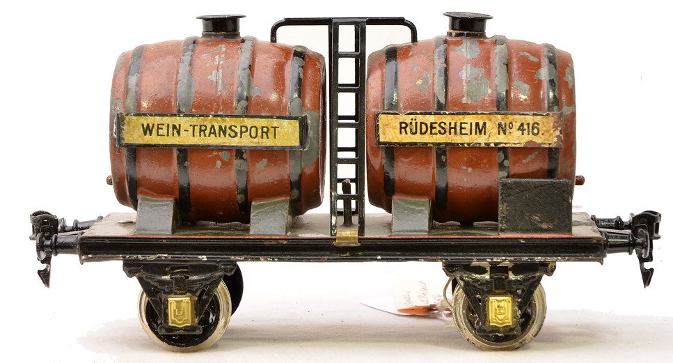 Marklin 416 Double Barrel Wine Transport Car: Marklin prewar gauge 1 416 double barrel wine transport. The wheels have been replaced on the transport. Transport is C5.