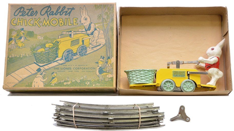Lionel 1103 Peter Rabbit Chick Mobile Hand Car OB: Lionel prewar O gauge 1103 Peter Rabbit Chick Mobile clockwork hand car with original key and eight curve track sections in OBs. The colors on the hand car are very bright. The basket has some box rub