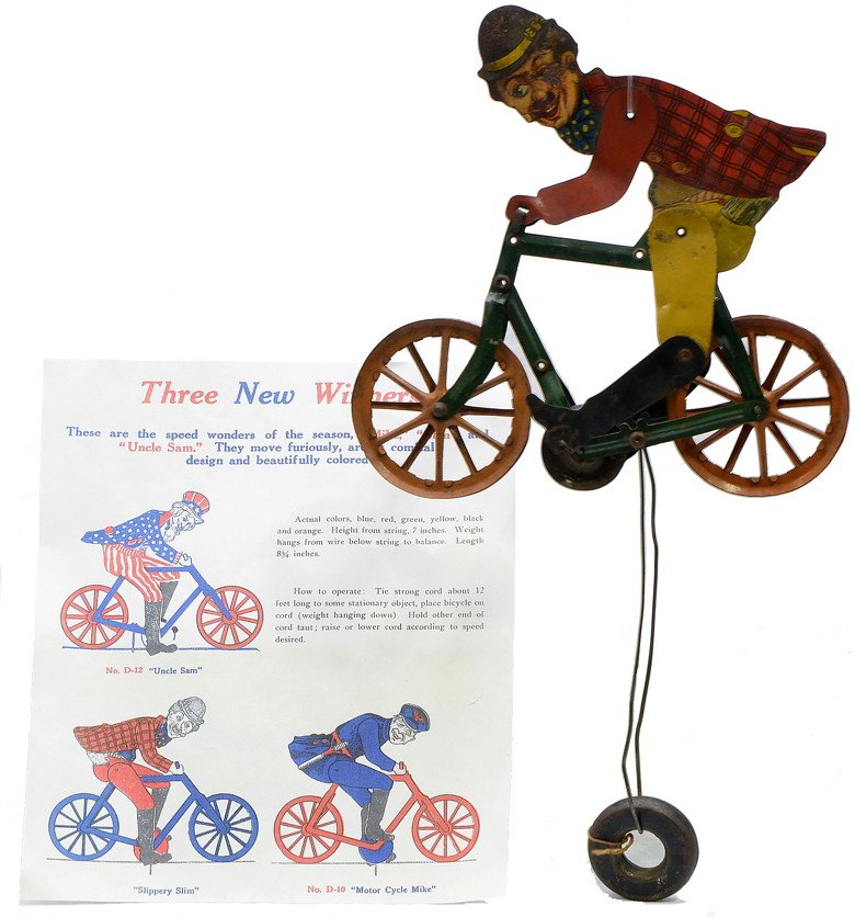 Am Flyer Slippery Slim Tin Litho Bicycle Toy: American Flyer Slippery Slim tin lithographed bicycle toy, circa 1915-17, C5. This toy was purchased from the estate of Lou Redman.