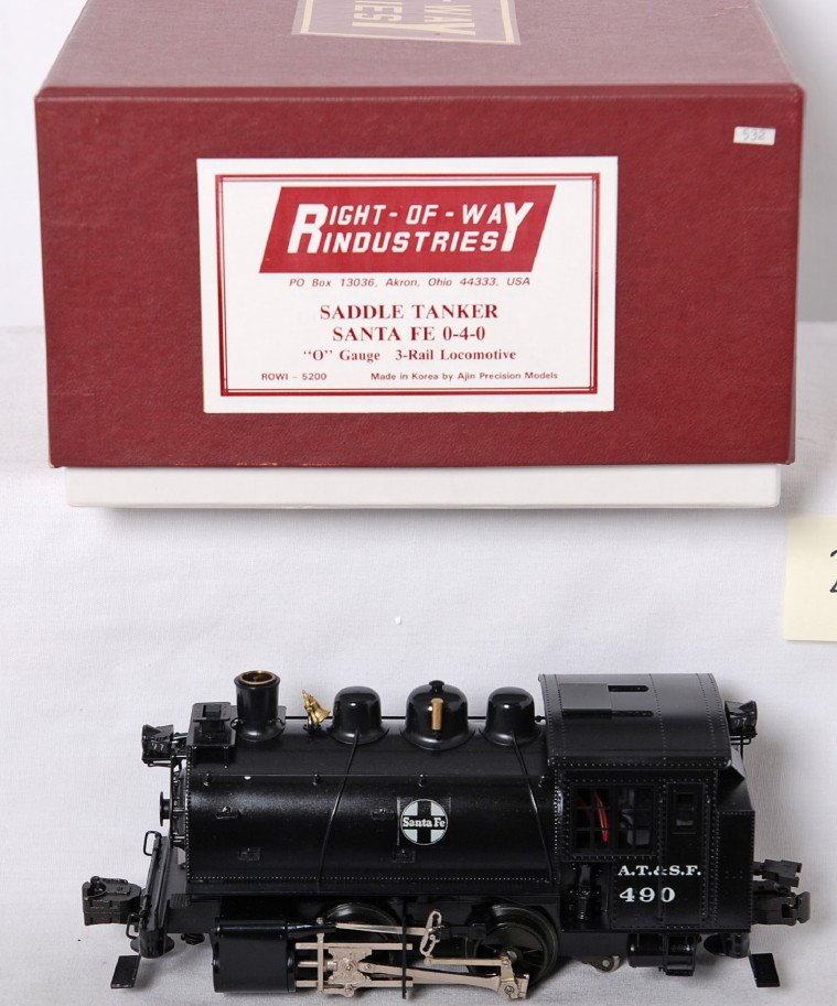 ROW brass Erie 0-4-0 saddle tanker: Right of Way modern O gauge brass Santa Fe 0-4-0T saddle tanker in OB. Loco has brass body construction and is C8-9 with a very faint roller mark.