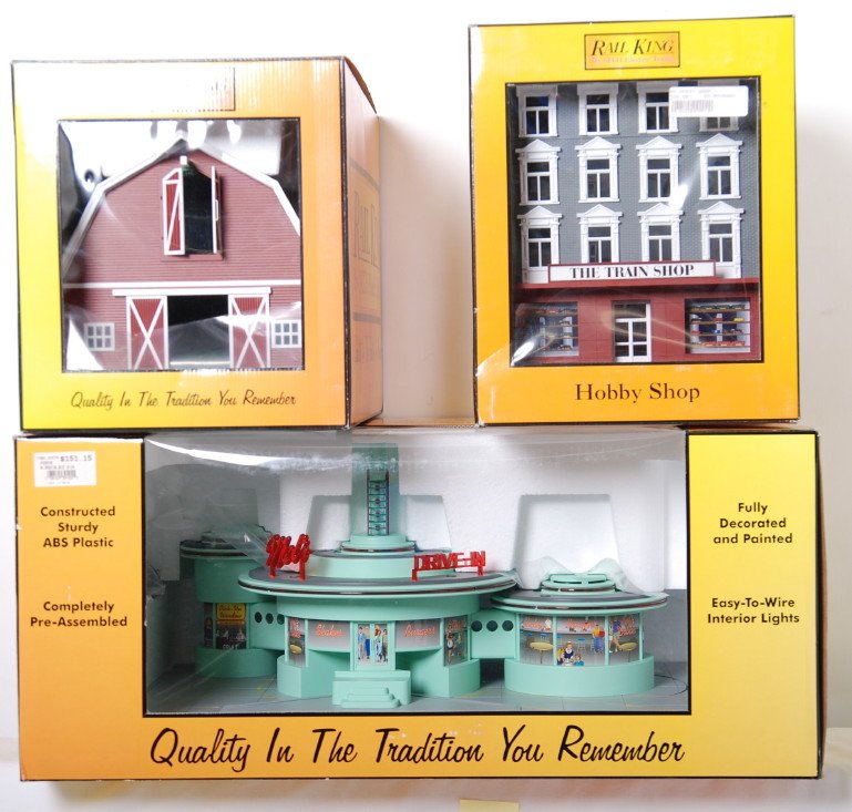 RailKing Mels Diner, hobby shop, and barn: MTH Railking modern O gauge accessories in OBs. Includes 30-9105 operating MelÕs Diner, 30-9004 hobby shop, and 30-9072 barn with white trim. C9-10.
