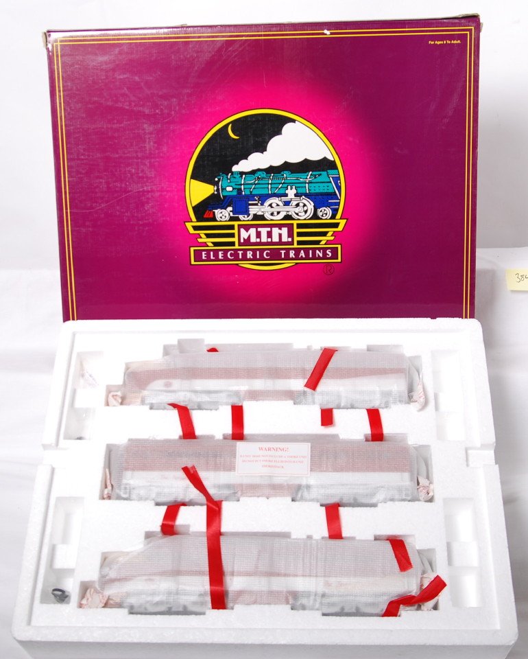 MTH MKT Alco PA A-B-A with Proto: MTH modern O gauge 20-2194-1 MKT Alco PA A-B-A set in OB. Loco features Protosound, Protosmoke, Protocouplers, and more. Locos are factory wrapped C10. OB has some light wear.