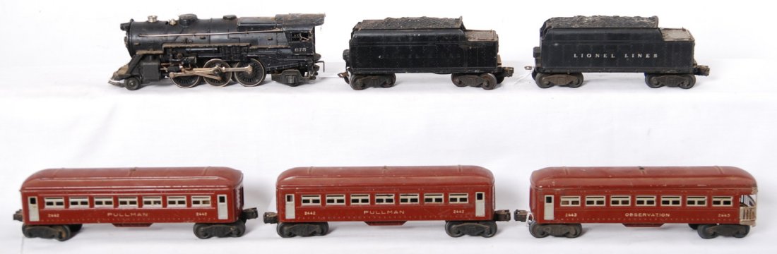 Lionel 675, 6466WX, 2466WX, 2442, 2442, 2443: Postwar Lionel O gauge 675 steam locomotive, 6466WX tender with whistle repainted, 2466WX tender with whistle, two 2442 Pullman, and 2443 observation (roofs maybe repaints). Trains should clean C6.