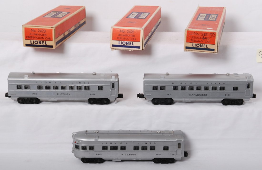 Lionel 2421, 2422, 2423 passenger cars in original: Postwar Lionel O gauge 2421 Maplewood Pullman, 2422 Chatham Pullman, and 2423 Hillside observation, C7 area cars in boxes with a missing and or detached flap. Boxes are clean, very square and solid.