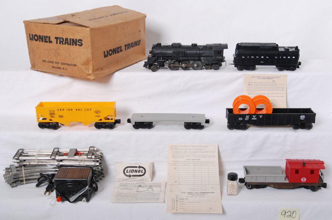 Lionel 11620 027 freight set in OB, 2029, 234W....: Postwar Lionel O gauge promotional outfit No. 11620 including; 2029-25 steam 2-6-4 loco, 234T-25 tender with 234W heat stamped on each side, 6402-50 flatcar with two 40-11 orange cable reels, 6176 Leh