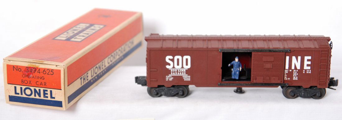 Lionel 3494-625 Soo operating box car in original: Postwar Lionel O gauge 3494-625 Soo operating boxcar in original box, specks of rust on some door guides, otherwise unrun C9-10. Box has tape repairs, C7-8, very square and bright.