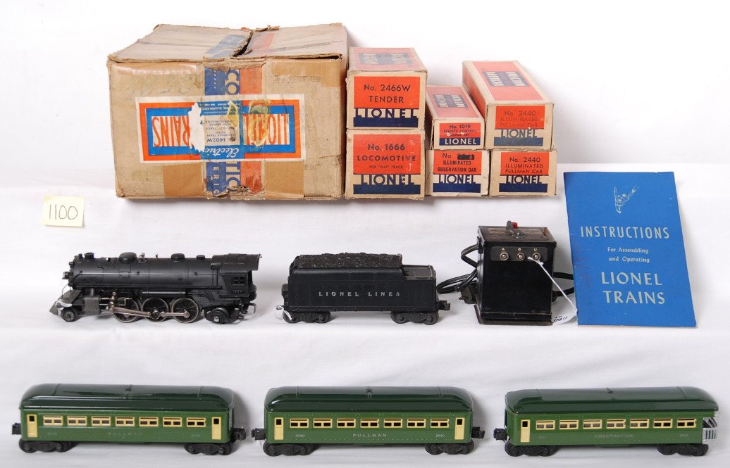 Lionel 1402W passenger train outfit w/R.C. whistl: Postwar Lionel O gauge 1402W passenger train outfit with 1666 steam locomotive, 2466W silver lettered tender with whistle, two 2440 illuminated Pullman coaches, and 2441 illuminated observation. Train