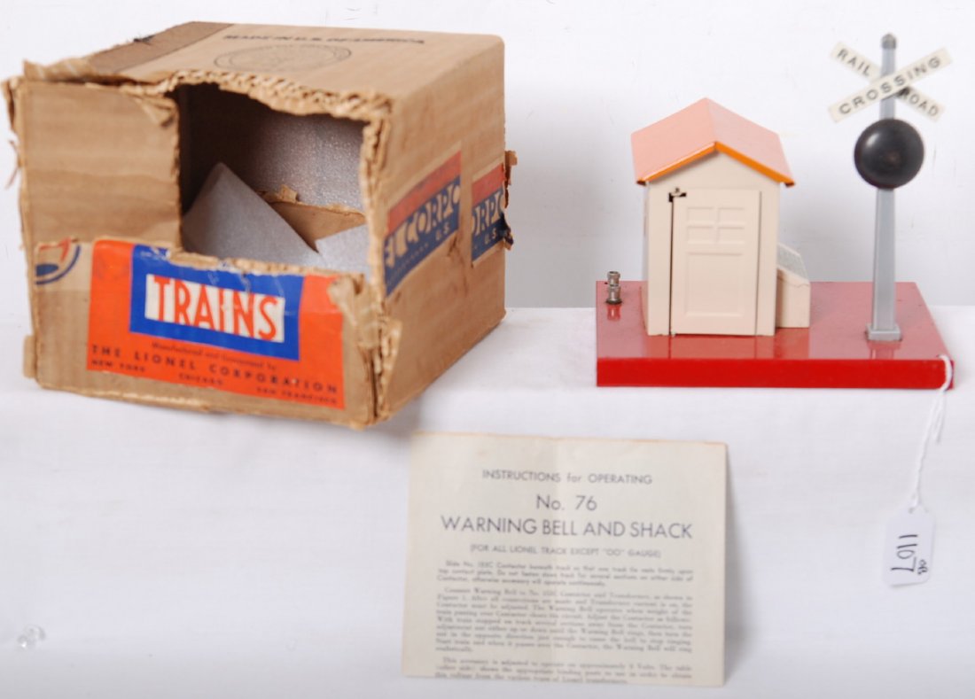 Lionel No. 76 warning bell and shack in OB w/inst: Prewar Lionel O gauge No. 76 warning bell and shack in original box with instructions sheet, should clean and polish better C8. Box is missing flaps. Instructions sheet included.