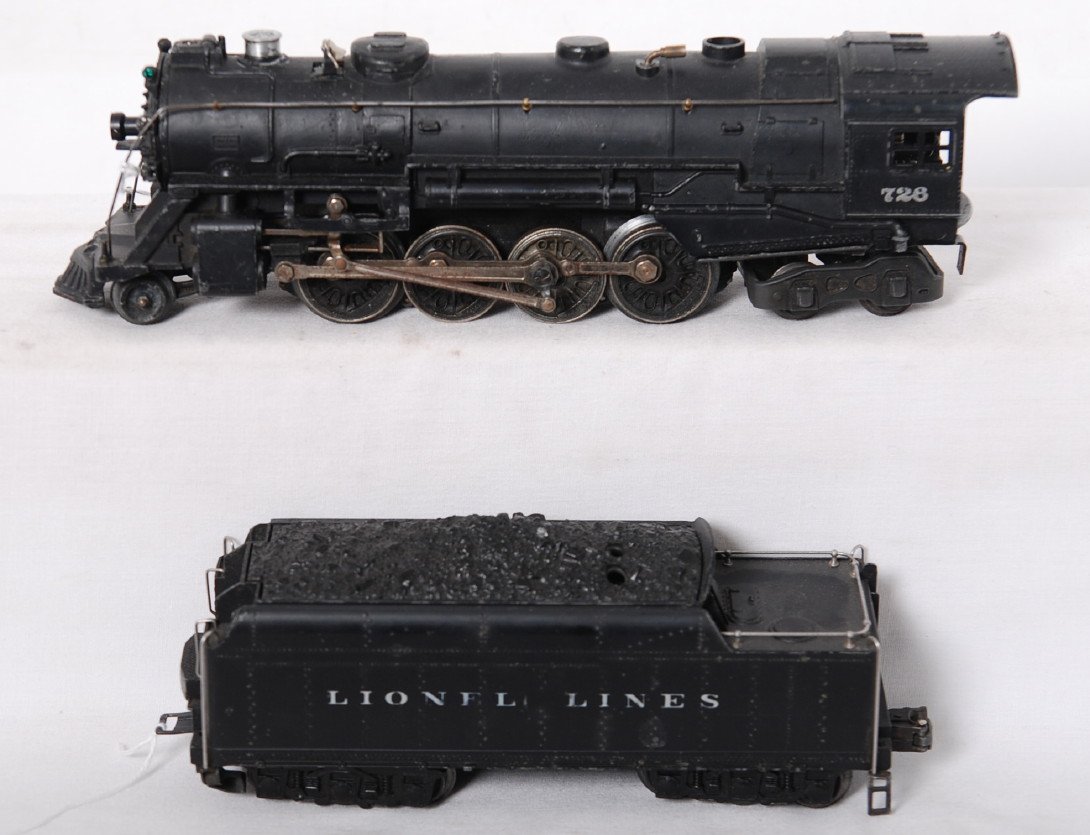 Lionel 726 steam loco and 2426W tender w/whistle: Postwar Lionel O gauge 726 steam locomotive and 2426W tender w/whistle. Tender has a bent step. Train looks C6.