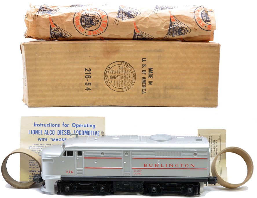 Lionel 216 Burlington Alco A Unit MINT Boxed: Lionel postwar 216 Burlington Alco A unit, circa 1958 with instruction sheet, inspection tag, original paper wrap and two round cardboard coupler rings in OB. The lettering and stripes on the Alco are