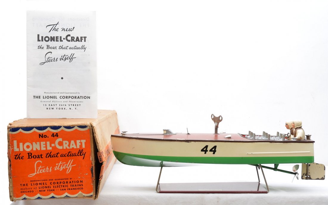 Lionel-Craft no. 44 Clockwork Boat w/Stand OB: Lionel-Craft prewar no. 44 clockwork racing boat with figures, key and stand in OB, C7. The OB has one repaired flap on the bottom of the box. The label has bright color graphics and is intact.