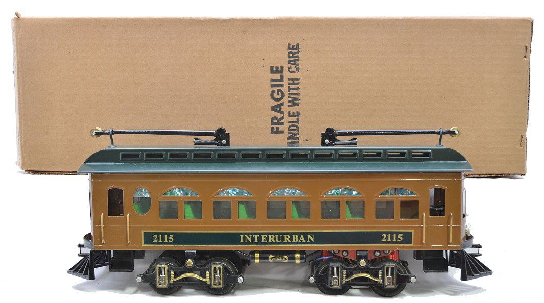 Pride Lines Repro of 2115 Voltamp Interurban MINT: Pride Lines reproduction of the standard gauge 2115 Voltamp Interurban. The body of the Interurban is brown and the roof is green. The trucks are cast metal and the wheels are spring loaded and set up