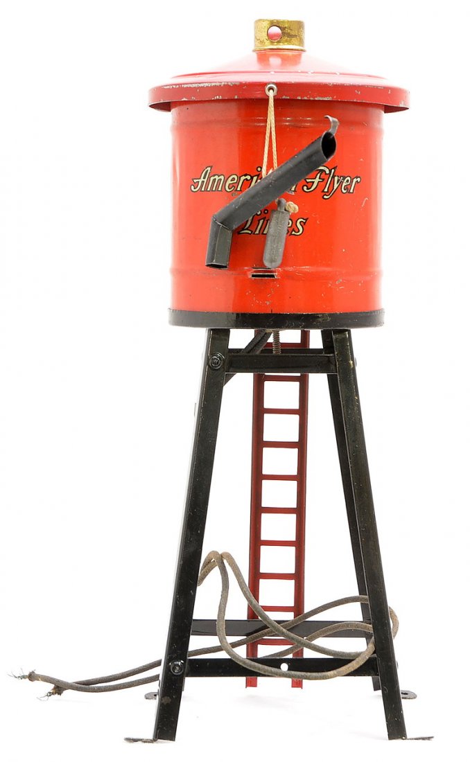 Am Flyer Prewar 2020 Water Tank: American Flyer prewar O gauge 2020 water tank with a black tower and spout, red tank that has a darker red roof and dark red ladder. The tank has some fading and is lithographed American Flyer Lines.