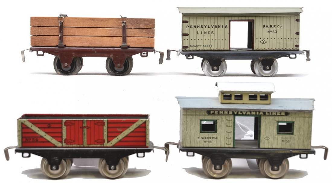 Ives 4-Wheel Freight Cars 57 Litho 54 53 56: Ives prewar O gauge four wheel freight cars with black frames including; 57 brown flatcar with lumber load, 54 red lithographed gravel car, 53 Pennsylvania Lines wood lithographed merchandise car and