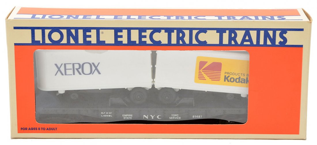 Lionel TTOS 17871 NYC Flat w/Kodax Xerox Trailers: Lionel Toy Train Operating Society (TTOS) National Convention 17871 NYC flatcar with Kodak and Xerox trailers, circa 1987 in OB. The car has never been run, C10.