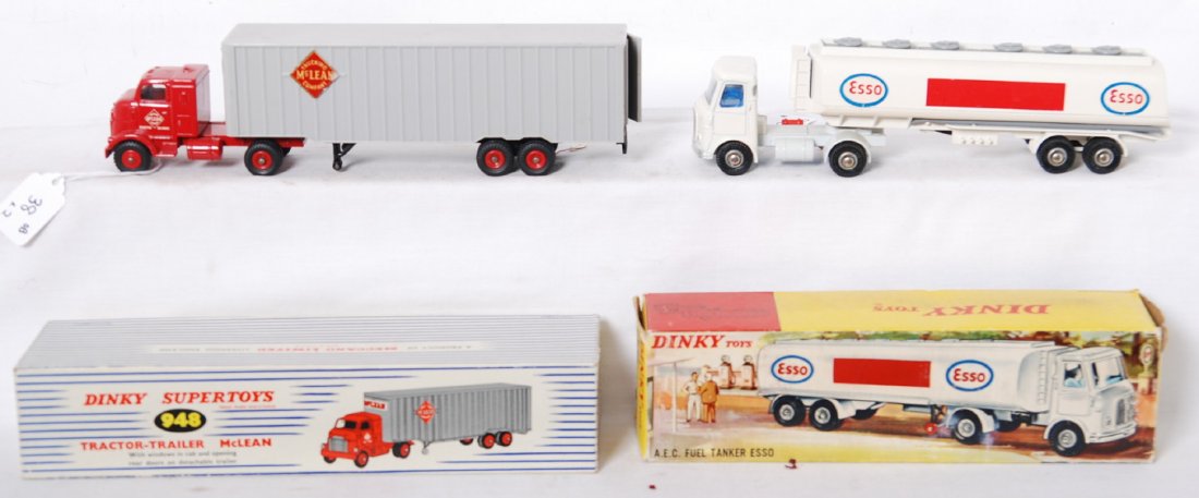 Dinky Toys 948 McLean and 945 A.E.C. Esso in OB: Dinky Toys 948 Tractor Trailer McLean, and 945 A.E.C. Fuel Tanker Esso. Trucks look C8-9. Boxes look, C8-9.