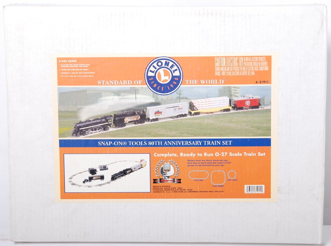 Lionel Snap-On Tools Anniversary Set 31911: Lionel modern O gauge Snap-On Tools 80th Anniversary freight train set no. 31911. Set is C8 with run time. OB has some light wear and dirt.