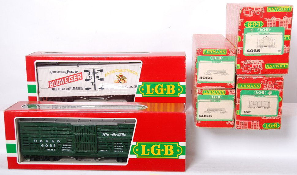 Six LGB American freight cars in OB, 4070, 4068.: Modern era LGB G scale American freight cars in original boxes, 4065 DRGW caboose, two 4066 lumber cars, 4070 Budweiser reefer, 4068 D&RGW stockcar, and 4067 D&RGW boxcar, trains look C8-10. Boxes sho