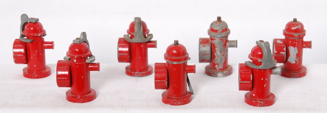 Seven toy fire truck hydrants diecast Tonka Toys: Seven Tonka Toys die cast fire truck hydrants. Four have built in spigots/valve wrenches, one has wrench valve/spigot, and two are missing wrenches. One is C4-5 with oxidation. Rest are C6-7.