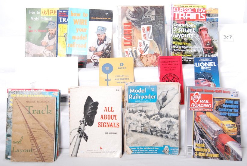 Lionel catalogs, Classic Toy Trains, Kalmbach bo: Large group of model railroad books and paper. Includes Lionel 1947 and 1950 catalogs, 15 issues of CTT and O gauge railroading, Lionel M2a and L2a brochures, and twelve model railroad books. See phot