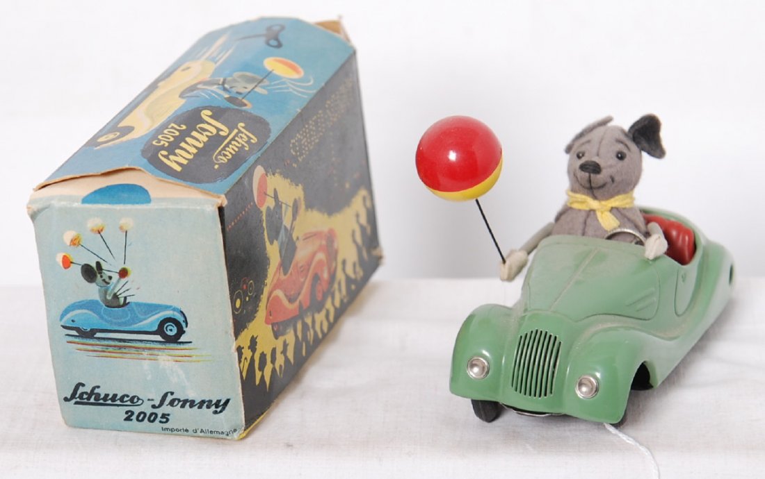 Schuco-Sonny 2005 mouse driving car in OB: Postwar Schuco-Sonny 2005 mouse driving car with balloon in original box, C9. Box is missing an end flap.