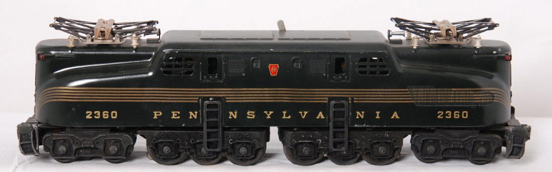 Lionel green 2360 5 stripe PRR dual motor GG1: Lionel postwar O gauge 2360 Pennsylvania green GG1. I am 97% sure this is one of the best restorations I have seen on a GG1. The lettering that is the original heat stamping has been filled in to look