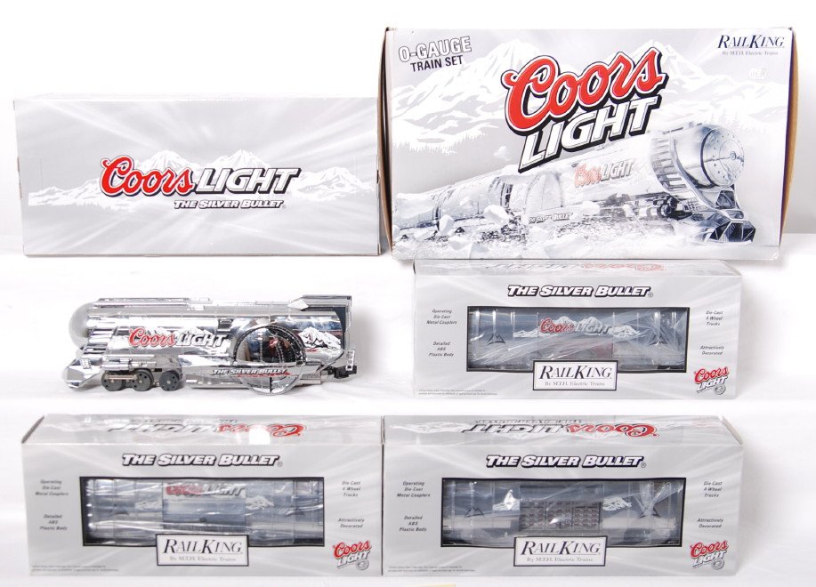 Railking Coors Light silver bullet set: MTH Railking modern O gauge Coors Light silver bullet set in OB. Catalog number is 30-1433-1. Set features Protosound 2.0, DCS control, smoke and much more. Set is C8 condition with run time. OB has l