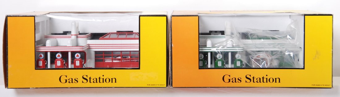 2 Railking operating gas stations CITGO and Sinc: MTH Railking modern O gauge operating gas stations in OBs. Includes 30-9113 Citgo and 30-9101 Sinclair. Items are C9-10. OBs have some light shelf wear.