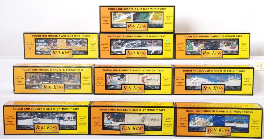 10 Railking Christmas boxcars: MTH Railking modern O gauge Christmas boxcars in OBs. Ten cars include 7434, 7426, 7454, 7489, 74183, 74115, 74038, 74257, 74442, and 74356. C9-10, OBs have some light shelf wear and price stickers.