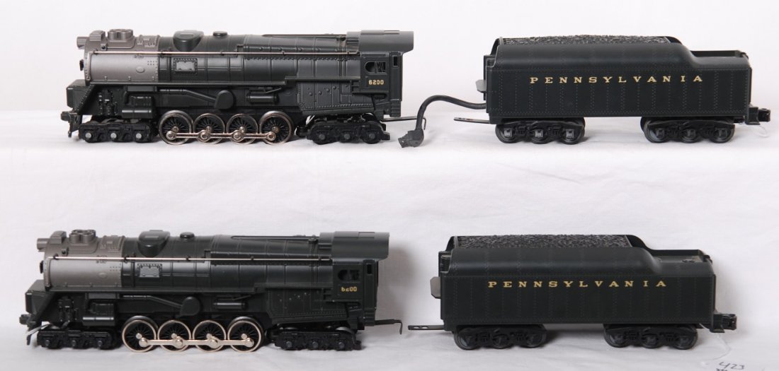 2 Railking Pennsylvania turbines with Proto 2: MTH Railking modern O gauge Pennsylvania Pennsylvania baby turbine steam locomotives. Both locos include Proto 2 although one is missing the tender. Locos are C7 however are sold as is due to missing 