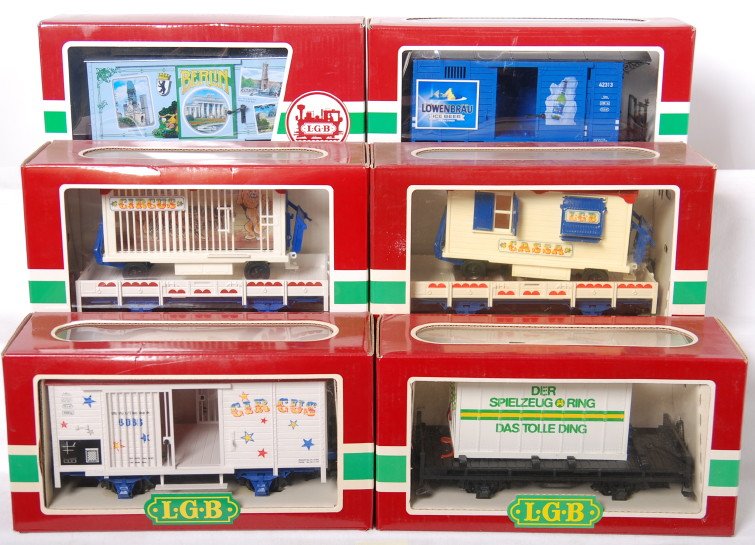 6 LGB cars 4036, 4037, 4038, 42313, etc: LGB modern G scale freight cars in OBs. Six cars include 44355 Berlin wagon, 4003SR flat with Das Tolle Ding wagon, 42313 Lowenbrau beer wagon, 4037 Circus flat with trailer, 4036 Circus cage wagon, a