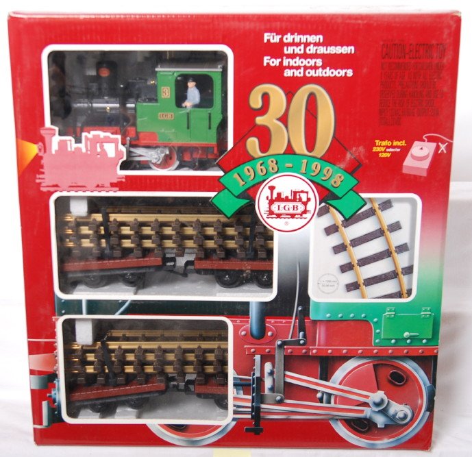 LGB 73968 30th Ann. lumber set: LGB modern G scale 73968 30th anniversary lumber set in OB. Set includes track and transformer. Set is C8 with some run time. Set lid has some corner and shelf wear.