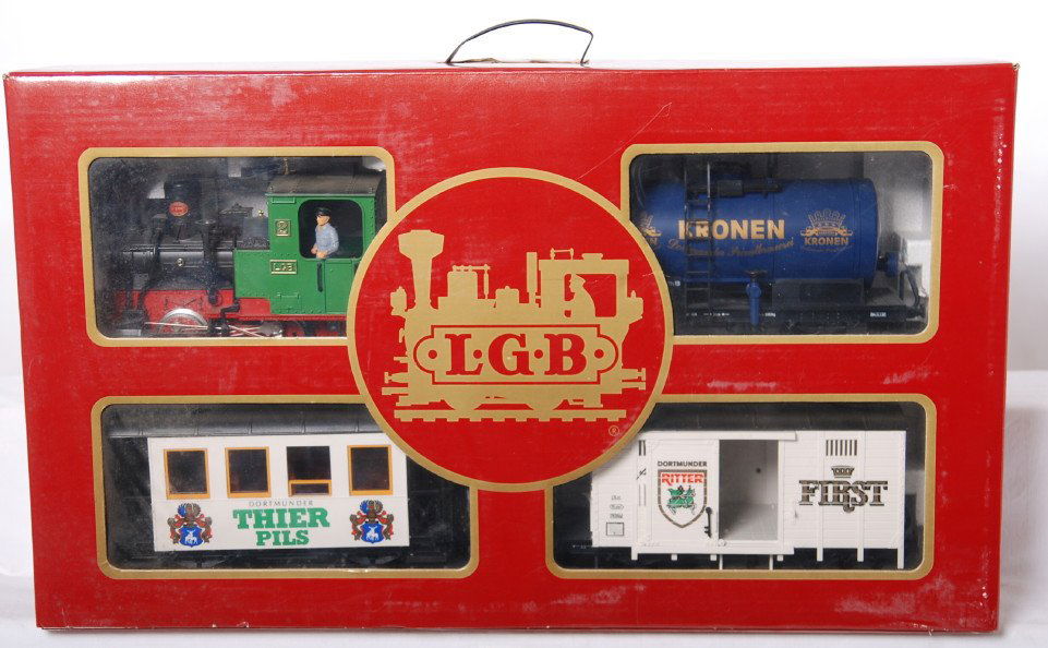 LGB Dortmunder Beer train set: LGB modern G scale Dortmunder Beer train set in OB. Set is C8 with run time. OB has some light shelf wear on the front of the box.