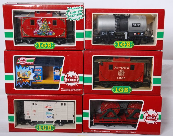 6 LGB freight cars 94308, 4065, 4040C, etc: LGB modern G scale freight cars in OBs. Six cars include 94308 Haribo exploding boxcar, 41020 flat with cable reels, 4065CT Christmas caboose, 4032 Nestle wagon, 4040C BASF tank, and 4065 Rio Grande c