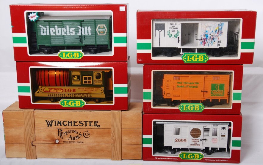6 LGB cars 47670, 35190, 43260, 4033,etc: LGB modern G scale freight cars in OBs. Six cars include 47670 limited edition Winchester boxcar, 4028 Berlin boxcar, 35190 2000 LGB club boxcar, 30421 LGB keg car, 43260 Diebels reefer, and 4033 Vede