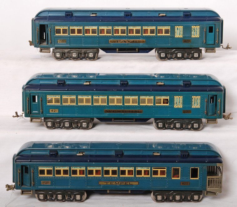 Lionel 420, 421, 422 Blue Comet passenger cars: Prewar Lionel standard gauge 420 Faye, 421 Westphal, and 422 Temple Blue Comet passenger cars, should clean and polish C6-7. Trains are mixed trim variations.