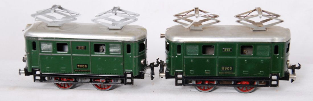 Two Bucherer Buco 212 electric locos, Made in Swit: Postwar Bucherer O gauge Buco 212 tinplate mechanical windup electric locomotives, C7-8. Made in Switzerland.