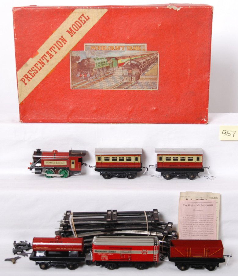 Modelcraft Train Central Railway steam freight Ind: Postwar Modelcraft Train O gauge Central Railway steam freight / passenger set in original box with track and clips, and paper literature. Set is comprised of 1964 steam tank loco, 1964 gondola, Petro