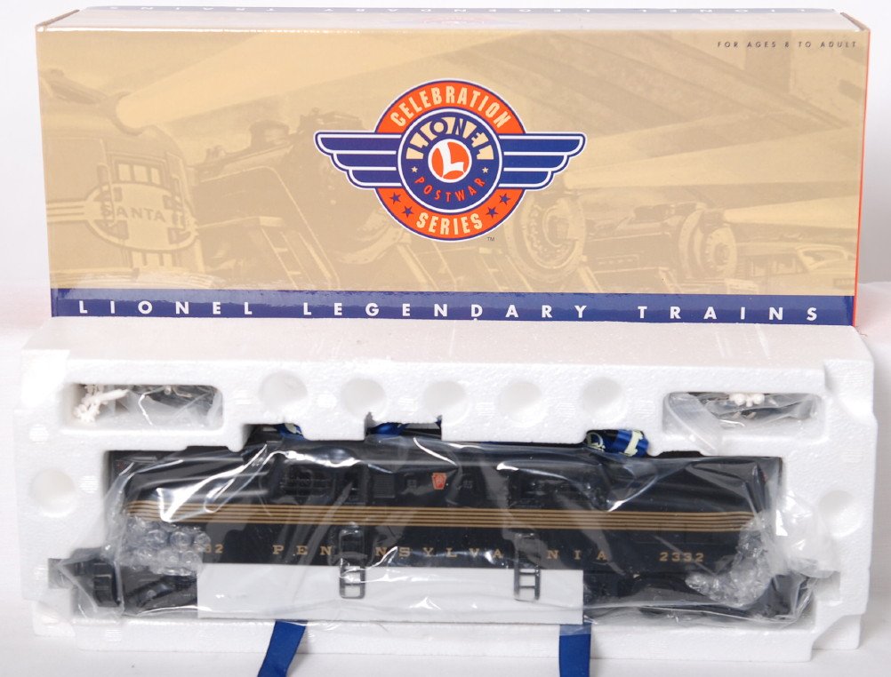 Lionel PWC 18343 Pennsylvania black GG-1: Lionel modern O gauge 18343 Postwar Celebration Series black Pennsylvania GG-1 electric locomotive. Loco features TMCC, Railsounds, Electrocouplers, and much more. Loco is factory wrapped in the inner