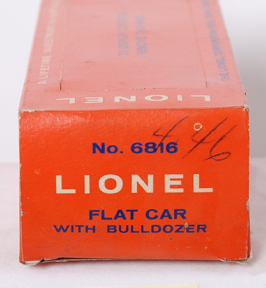 Lionel 6816 flat car with bulldozer OB flatcar or: Postwar Lionel O gauge 6816 flatcar with bulldozer empty original box, box only. Box has missing push in tab and small tear to an inner flap fold, otherwise C7-8 very bright box.